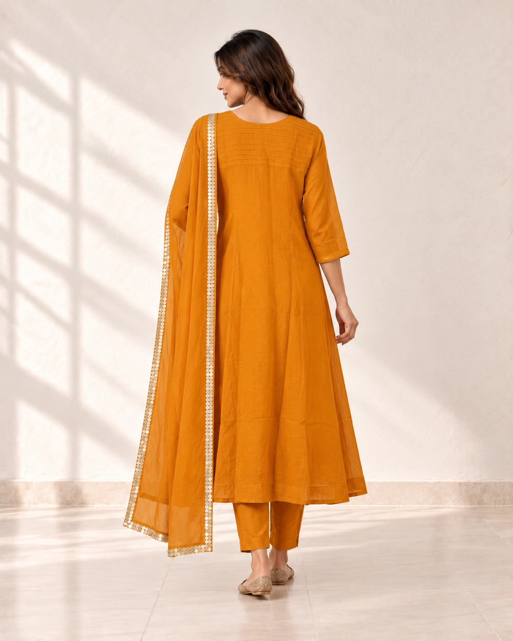 Aarohi Saffron Neck-Detail Kurta Set, back view